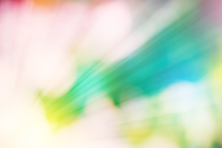 Green nature bokeh glitter defocused ray lights abstract background.の写真素材