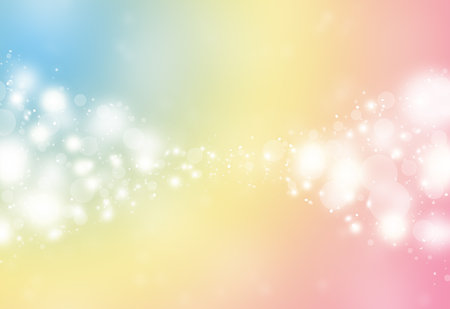 Pastel color sparkles glitter defocused rays lights bokeh abstract holiday background.の写真素材