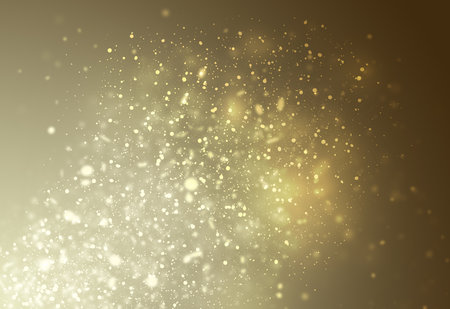 Golden glitter sparkles rays lights bokeh Festive Christmas Elegant abstract background.の写真素材