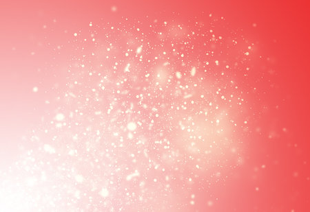 Solf Red  glitter sparkles rays lights bokeh Festive Christmas Elegant abstract background.の写真素材
