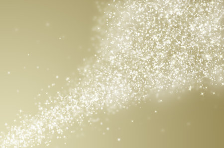 Gold glitter sparkles rays lights bokeh Festive Elegant abstract background.の写真素材