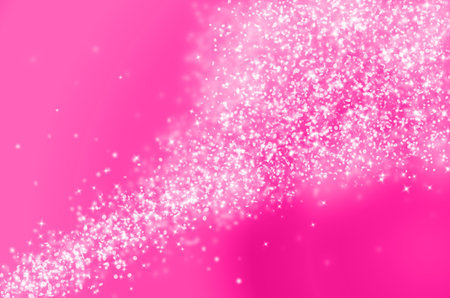Pink glitter sparkles rays lights bokeh Festive Elegant abstract background.の写真素材