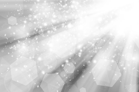 Grey glitter sparkles rays lights bokeh Festive Elegant abstract background.の写真素材