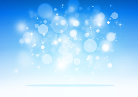 Blue glitter sparkles rays lights bokeh Festive Elegant abstract background.の写真素材
