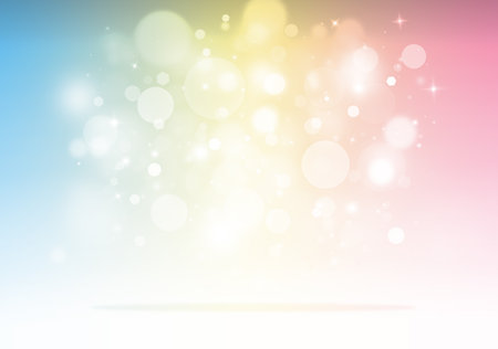 Pastel color glitter sparkles rays lights bokeh Festive Elegant abstract background.の写真素材