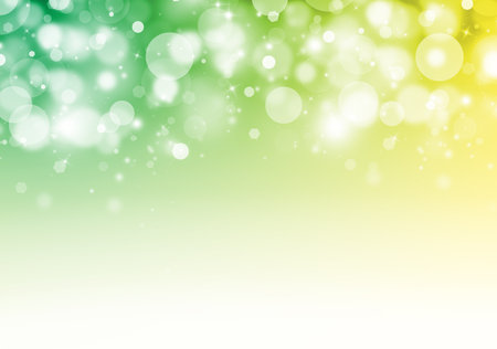 Green and Yellow glitter sparkles rays lights bokeh Festive Elegant abstract background.の写真素材