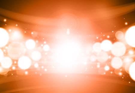 Orange glitter sparkles rays lights bokeh Festive Elegant abstract background.の写真素材