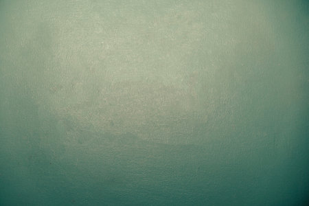 Green gradient rays lights  cement wall abstract background.の写真素材