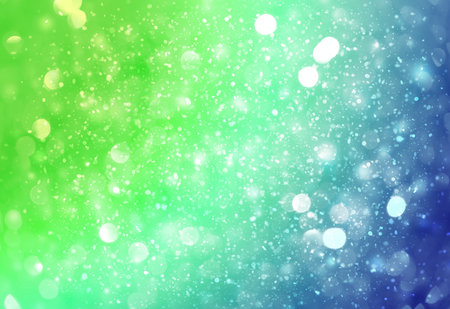 Green and Blue sparkle rays lights with bokeh elegant abstract background. Dust sparks in explosion background. Vintage or retro.の写真素材