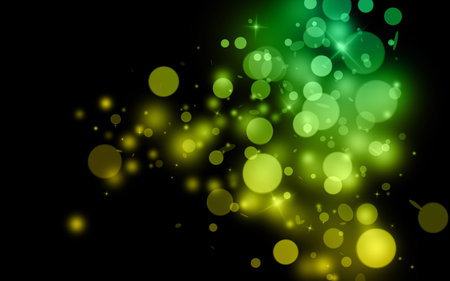 Green and Gold sparkle rays lights with bokeh elegant show on stage abstract background. Dust sparks background.の写真素材