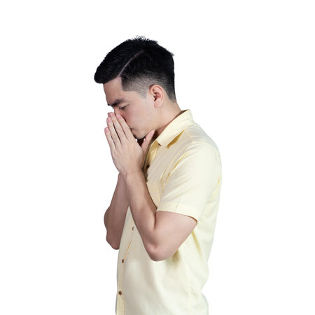 Portrait handsome young asian man wearing a yellow shirt stressed and anxiety sign isolated on white background in studio.Asian man people.business concept.の写真素材