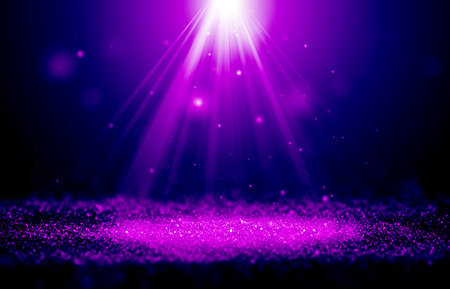 Purple and Pink sparkle rays glitter lights with spotlight bokeh elegant show on stage abstract background. Dust sparks background.Spotlight backgroundの写真素材