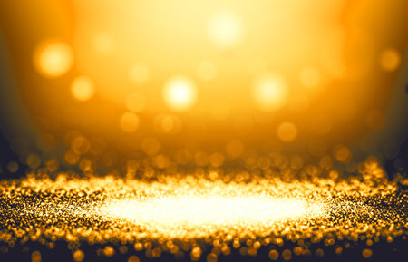 Gold and Yellow color sparkle rays glitter lights with spotlight bokeh elegant show on stage abstract background. Vintage background.Spotlight backgroundの写真素材