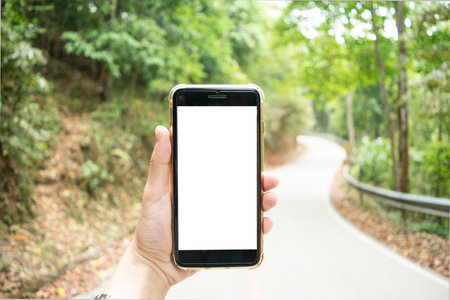 The young man's hand is holding a white screen phone, Mobile use phone concept