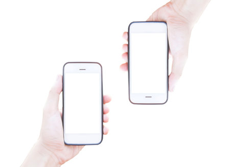 Young man using a mobile phone to take photos for memories.の写真素材