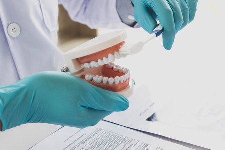 The dentist examining the teeth of the patient found that his teeth have improved.