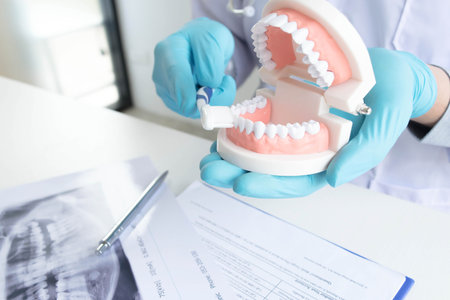 The dentist examining the teeth of the patient found that his teeth have improved.