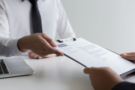 Executives are interviewing job applicants and preliminary background checks, candidates are talking...