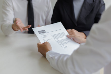 Executives are interviewing job applicants and preliminary background checks, candidates are talking...