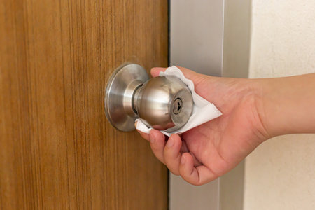 Women's hands are injecting 70% alcohol killing bacteria and the coronal virus or covid-19 to prevent germs, Inhibition of Covid-19 Virus Infection concept.の写真素材