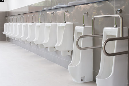 Men's white urinals design, Close up row of outdoor urinals men public toilet, Urinal concept.