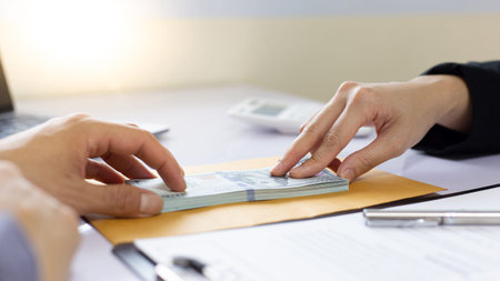 Businessmen give dollars to bribe employees in signing contracts to buy illegal land and real...