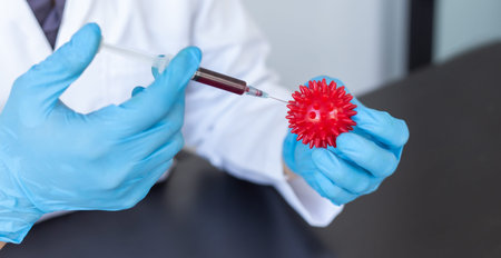 Scientists or doctors collect blood samples from new strains of virus patients for analysis and...