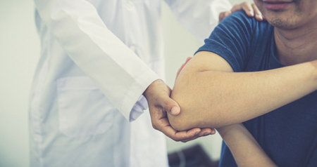 Physical therapists or physicians perform physical therapy for patients admitted to the hospital, Massage or muscle relaxation and physical therapy concept.の写真素材