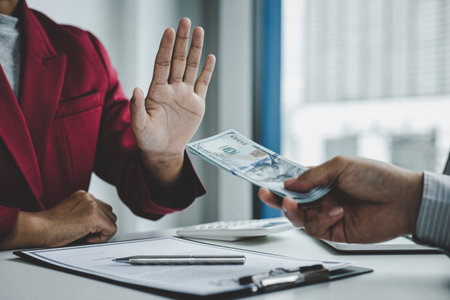Businessmen give dollars to bribe employees in signing contracts to buy illegal land and real...