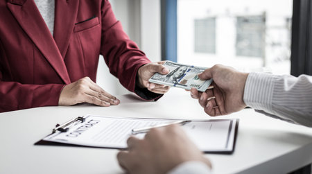 Businessmen give dollars to bribe employees in signing contracts to buy illegal land and real...