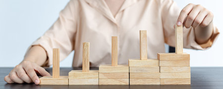 Arrange the wooden blocks into steps, higher the marketing strategy the more effort is required,...