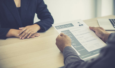 Managers or HR departments read resume and interview applicants for selection as a company real estate agent, Employment and selection of new staff representatives concept.の写真素材