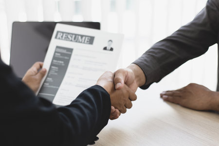 Employer or HR department welcomes new employees, Shaking hands with congratulations or achieving business and income success, Hand shak concept.の写真素材