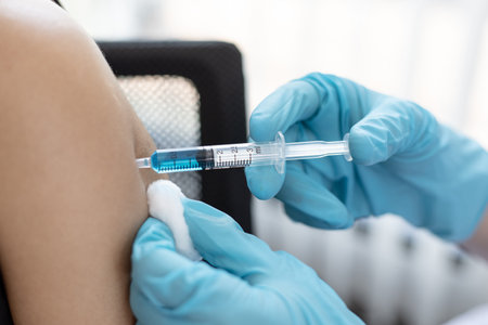 Doctor is vaccinating women with antibiotics or new antibodies to prevent the spread of the virus,...