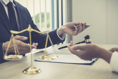 Attorneys or consultants work in the courtroom and negotiate with clients or complainants who want justice in corporate fraud cases, Litigation and justice concept.の写真素材