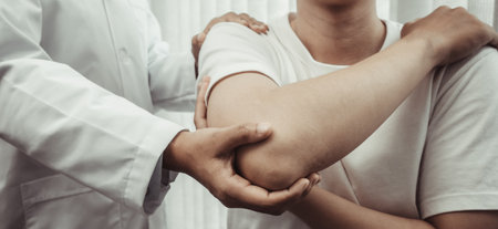 Professional therapists are stretching muscles, patients with abnormal muscular symptoms, physical rehabilitation therapies and treatment of physiological disorders by physiotherapists concept.の写真素材