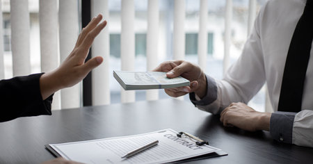 Businessmen give dollars to bribe employees in signing contracts to buy illegal land and real...