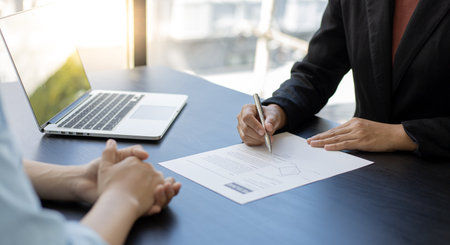 Approving and signing contracts concept, New employees are approved to work in the stock market and have signed contracts with major executives.の写真素材