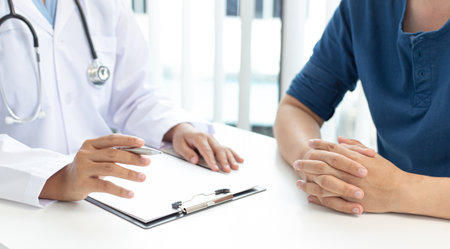 Doctor is currently diagnosing the disease and giving advice to psychiatric patients, Health analysis and consultation and treatment concept.の写真素材