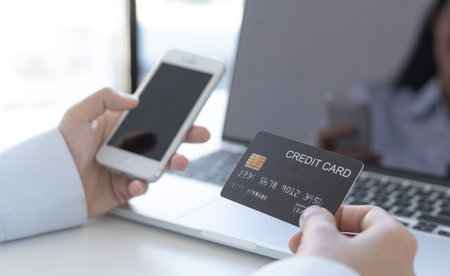 Counting money, businessmen have analyzed between cash and credit card which is consistent and...