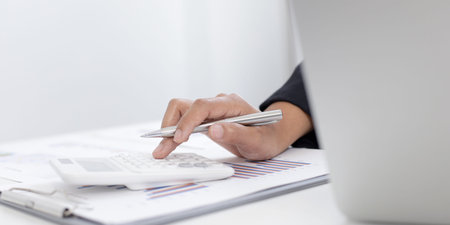 Accounting businesswomen are calculating income-expenditure and analyzing real estate investment...
