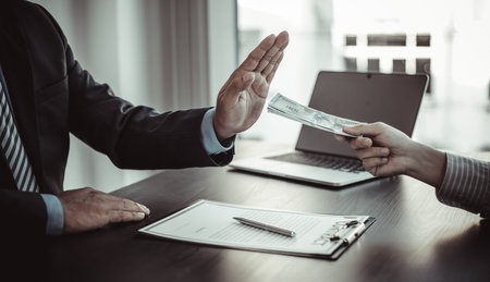 Businessmen give dollars to bribe employees in signing contracts to buy illegal land and real...