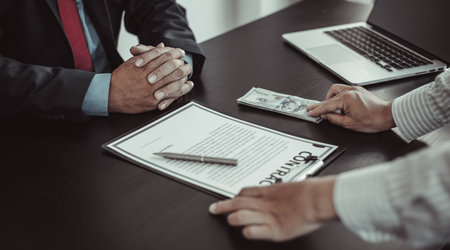 Businessmen give dollars to bribe employees in signing contracts to buy illegal land and real...