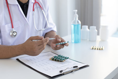 Specialist doctors advise and examine the history of patients in a direct health room at a modern hospital, Annual Health Check and Health Care Report concept.の写真素材