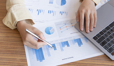 Meeting a team of businessmen, Executives and accountants meeting about the company's revenue graph...
