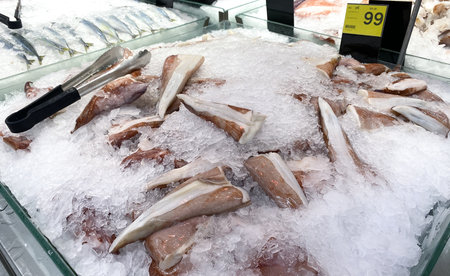 Tesco Lotus,THAILAND- February 3, 2021 : variety of fresh meat/ Fresh fish and seafood are arranged in proportion and orderly on the loot, Fresh food products in famous department stores.のeditorial素材