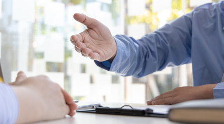 Employer or HR leader is interviewing participants, applying for a company employee, and having read the proficiency test resume to recruit qualified employees, Selection of job applicants.の写真素材