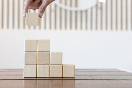 Arrange the wooden blocks into steps, higher the marketing strategy the more effort is required,...