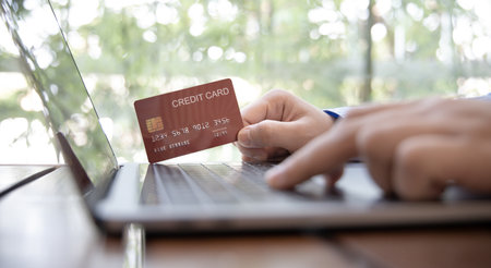 Businessman use laptop register via credit cards to make online purchases, Using the Internet in Online Marketing and Trading, Online shopping or Internet technology concept.の写真素材