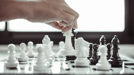 Businesswoman holding chess to take down opposing players, Proactive business planning and marketing...
